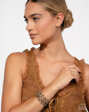 Load image into Gallery viewer, Timeless Tango - Gold UV Shimmer Bead Coil Bracelet - Paparazzi - Life of the Party September 2025
