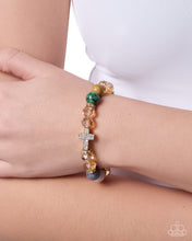 Load image into Gallery viewer, Celestial Crush - Multi Color Stone Gold Rhinestone Cross Stretchy Bracelet - Paparazzi
