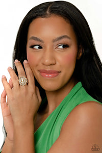 GLIMMER and Spice - Gold Ring - Paparazzi Life of the Party March 2023